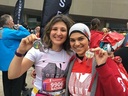 Youth Champions Nadine Ibrahim and Lama Younes celebrating after their run in support o CAI Academy. 